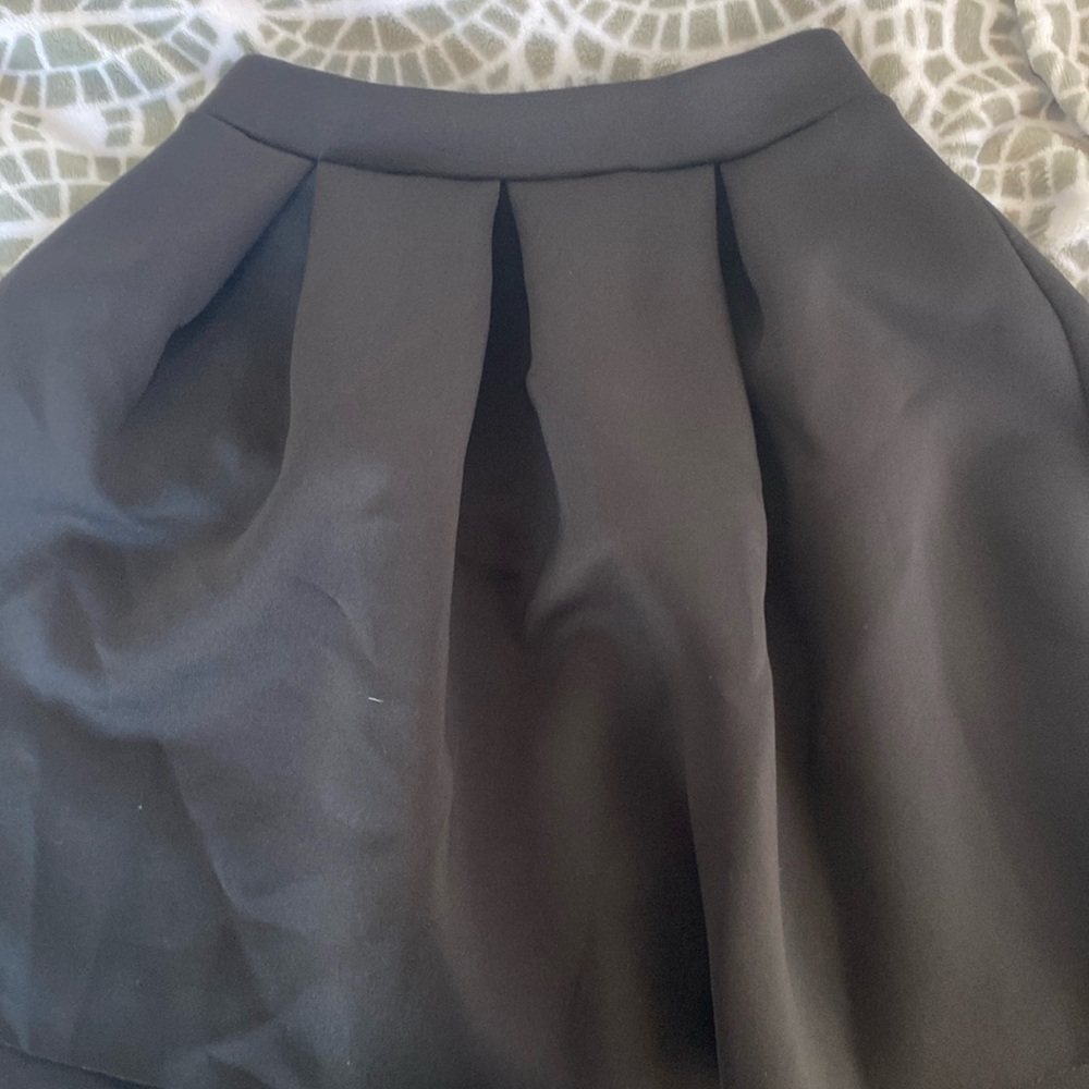 Black pleated skirt
